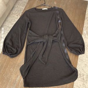 Size Small. Tie across black balloon sleeve dress.